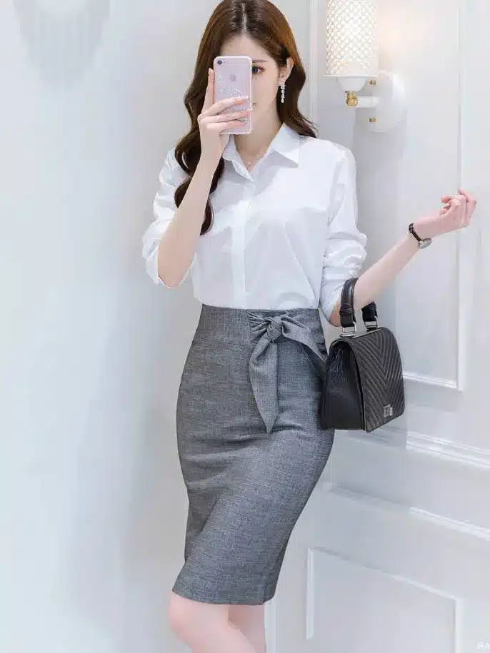 Những mẫu chân váy đồng phục công sở đẹp, thanh lịch cho nàng công sở 4 Những mẫu chân váy đồng phục công sở đẹp, thanh lịch cho nàng công sở